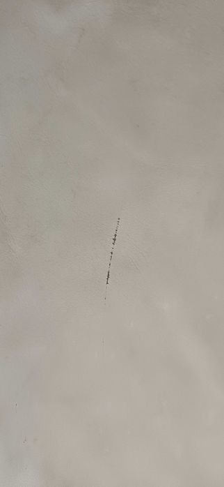 Sofá com puf e pés em inox