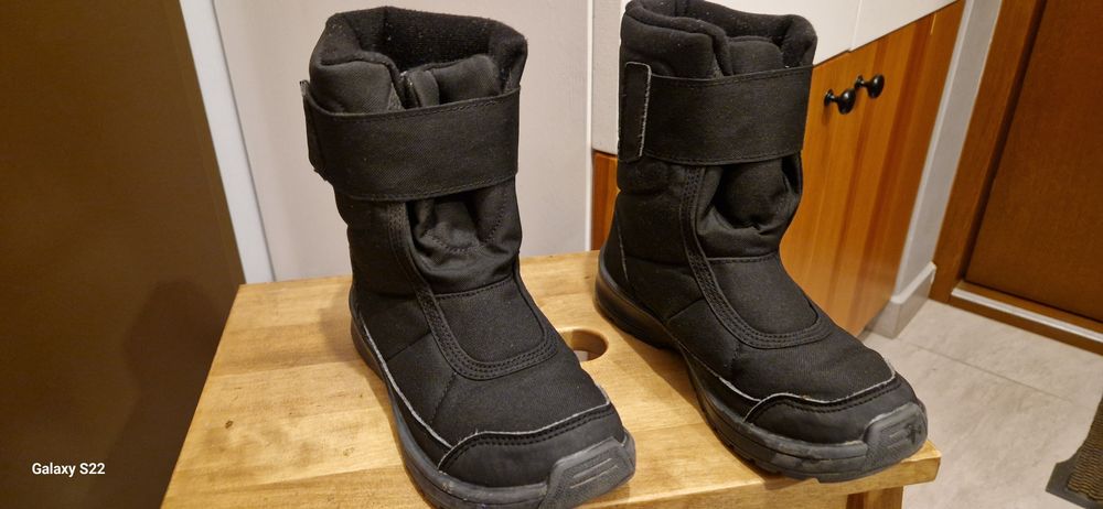 Używane Buty śniegowce czarne  Quechua.R32
Długość wkładki  20cm