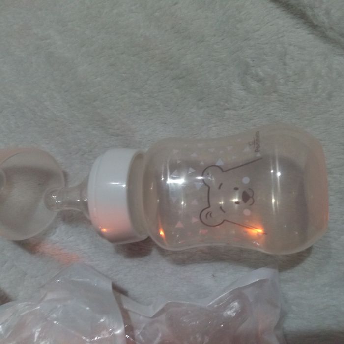 Biberão novo com 5 tetinas