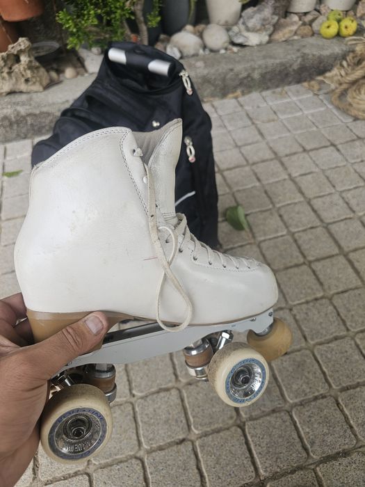 Patins de p. Artística mais mochila