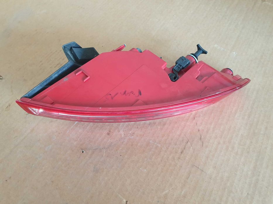 Renault laguna III 3 coupe lewa lampa tył tylna w błotnik