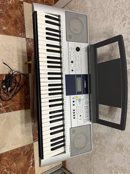 Yamaha E 323 Офіціал.