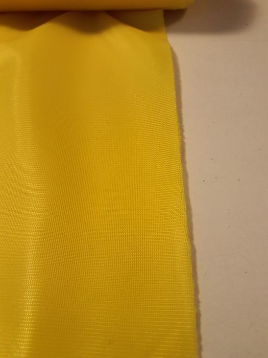 Tkanina stylonowa żółta szer.160 cm.