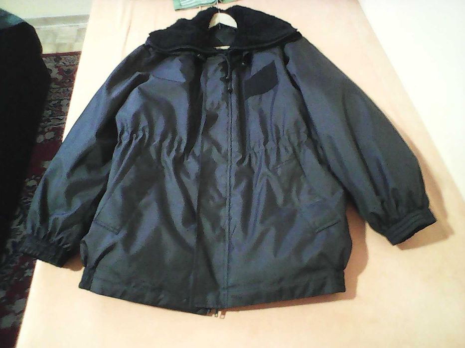 Zimowa ciepła kurtka Konfekcjoner rozmiar 92/160