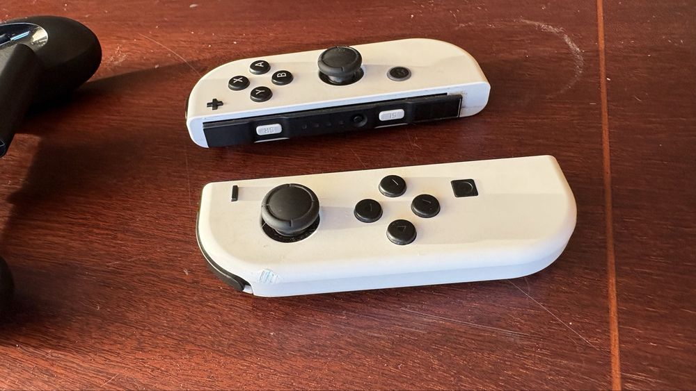 Nintendo Switch Oled Branca + Jogo Ring Fit Adventure + Película e Caixa de Transporte