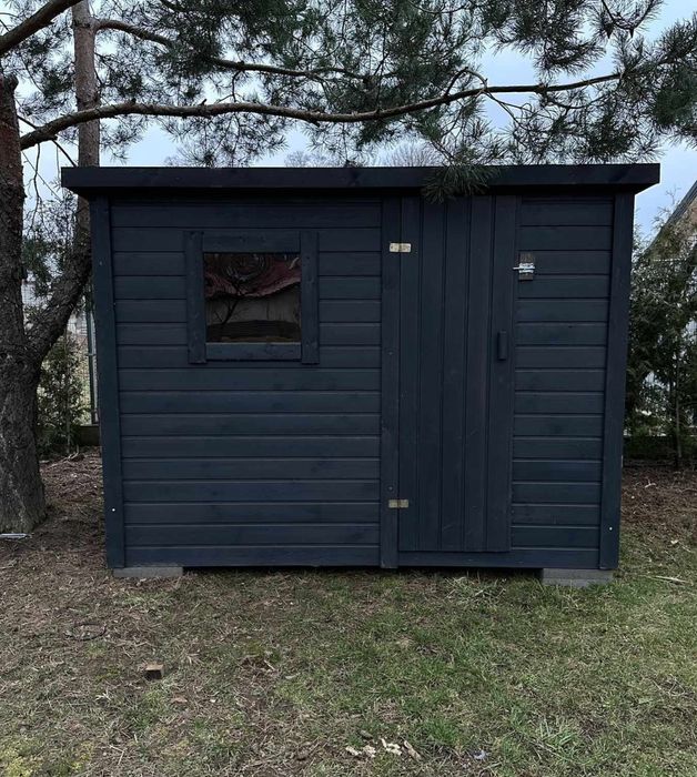 Drewniany domek dla ptaków