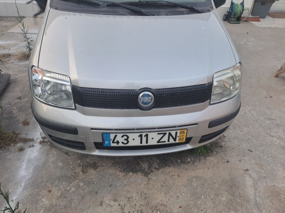 Vendo ou troco por moto 600cc/panda 63mil km