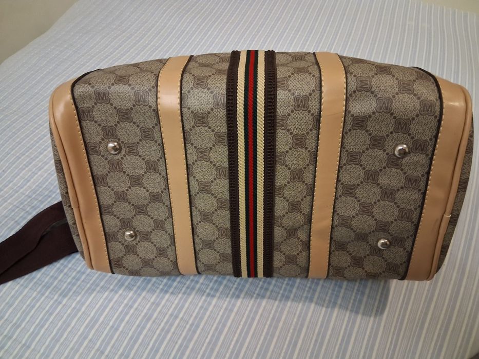 Mala Gucci como nova