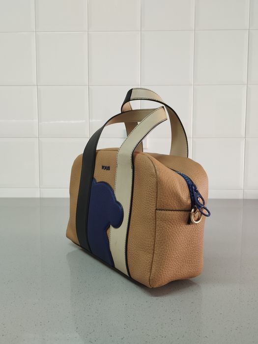 Malote da tous original em pele como nova.