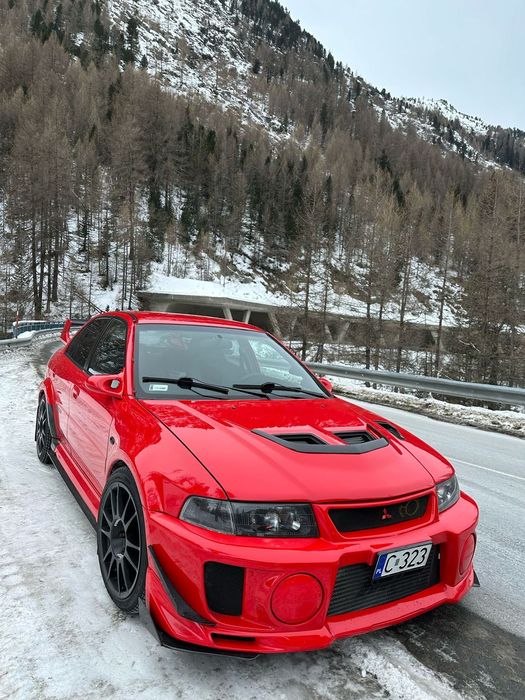 Mitsubishi Lancer Evolution Czerwona pięknosc lancer evo  IV  przyciąga wzrok idzie się zakochać.