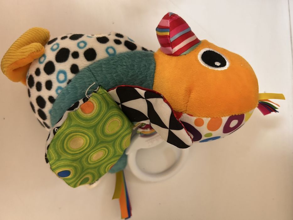 Іграшка на коляску