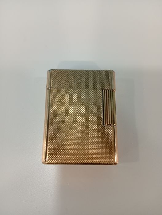 Isqueiro banhado a ouro