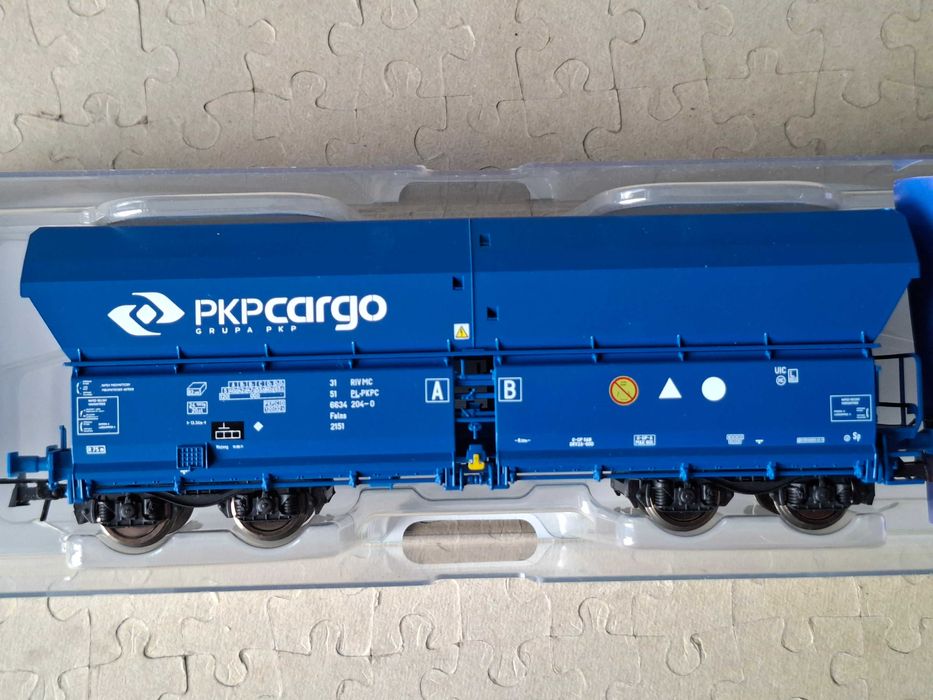Kolejka H0 ROCO wagon samowyładowczy typu Flans PKP Cargo nr boczny 31 51 6634 204-0