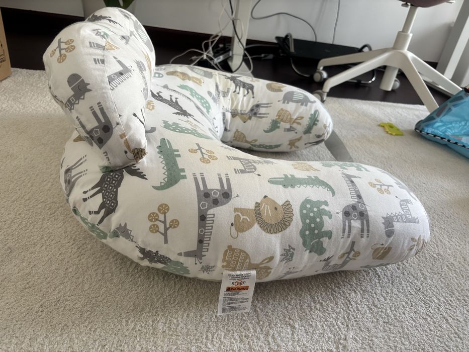 Almofada de amamentação como nova