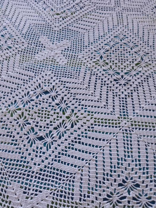 Colcha de renda feita à mão