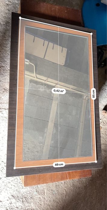 Espelho com rebordo em madeira
