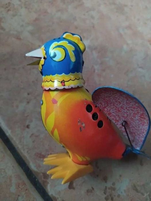 Brinquedo Pássaro em lata