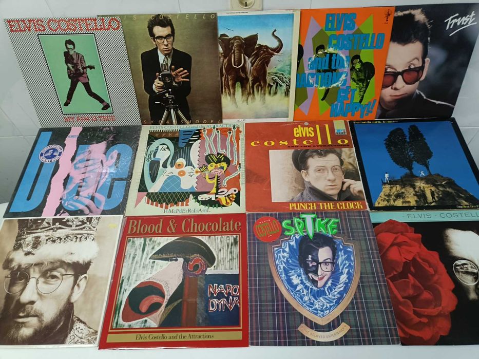 Discografias: ELTON JOHN Cat Stevens ROD STEWART Elvis Costello CLIFF