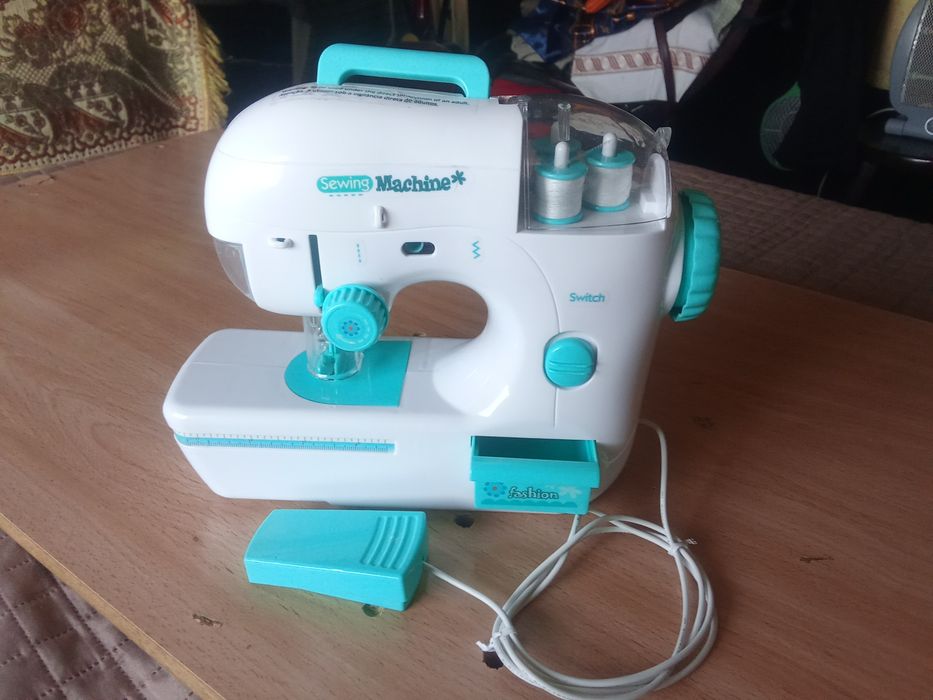 Máquina de costura Criança