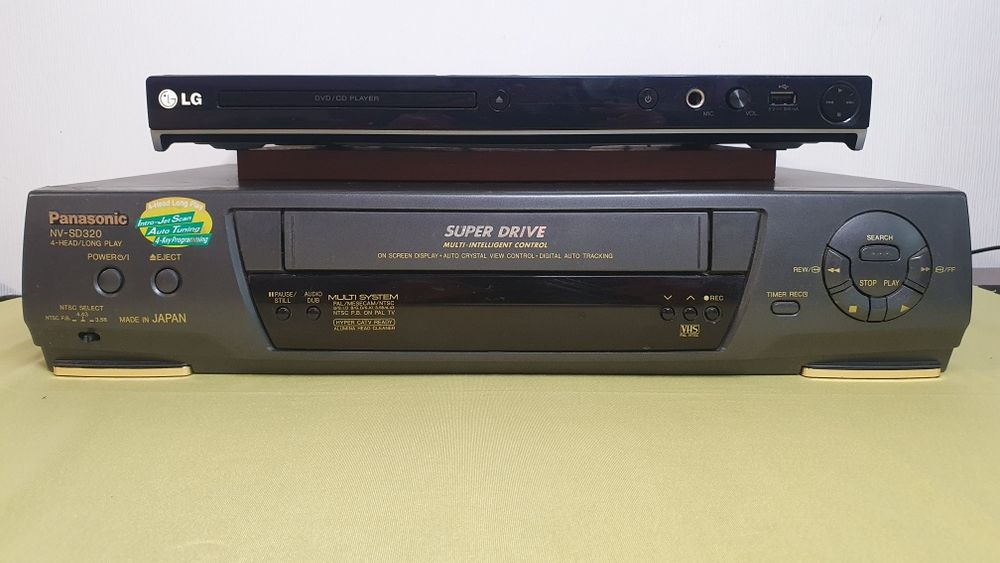Відеомагнітофон  Panasonic NV-SD 320 AMJ та DVD  програвач LG DVX  556 KH ( плеер)