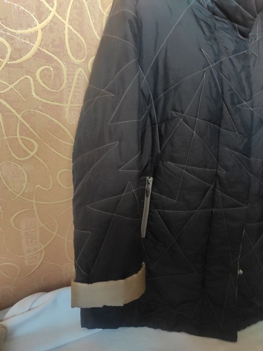 Жіноча зимова куртка 52 розміру.