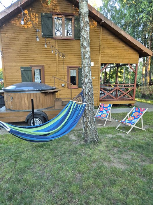 Domki letniskowe z kominkiem, jacuzzi i sauną.