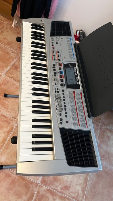 Teclado em-15 Roland