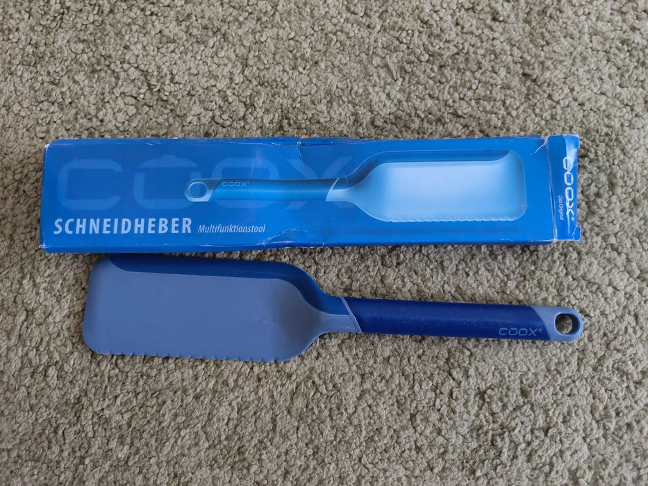 Cortador e elevador Coox fatiador e servidor de bolos.