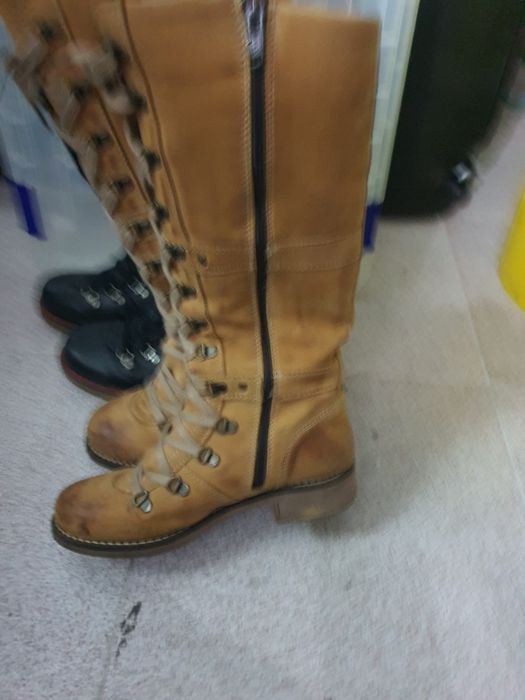 2 pares de botas cano alto  n° 36 novas