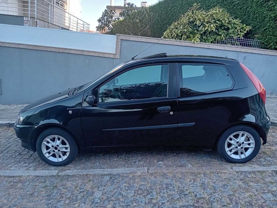 Fiat Punto 1.2 16v 80cv 6vel teto eletrico  direçao assistida