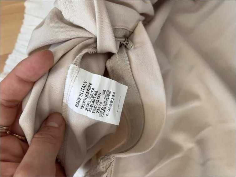 Beżowe szerokie spodnie Made in Italy
