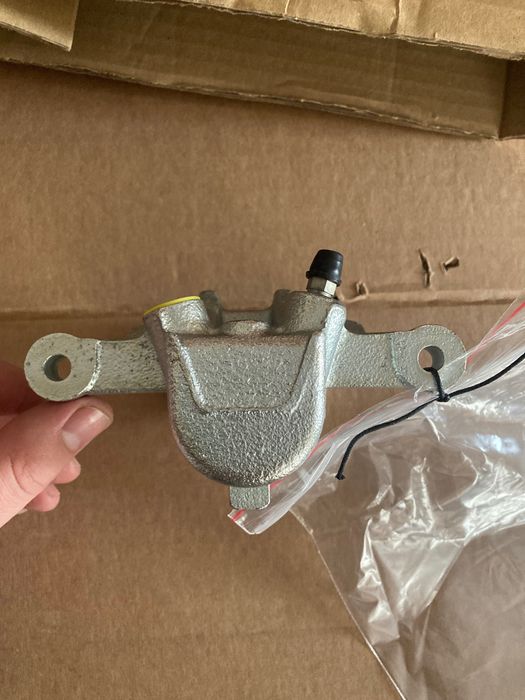 4773002110 Супорт гальмівний задній правий Toyota Corolla E12