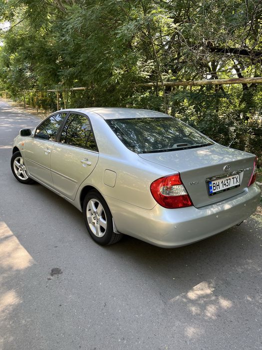 Камри 30, 2.4 газ/бензин на автомате.