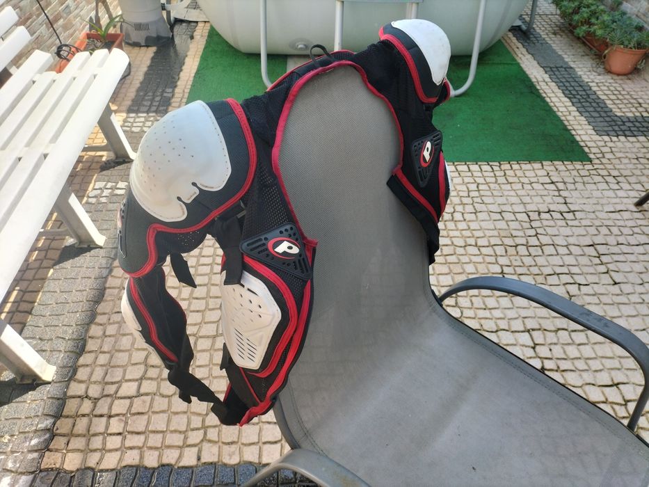 Botas Thor e colete integral