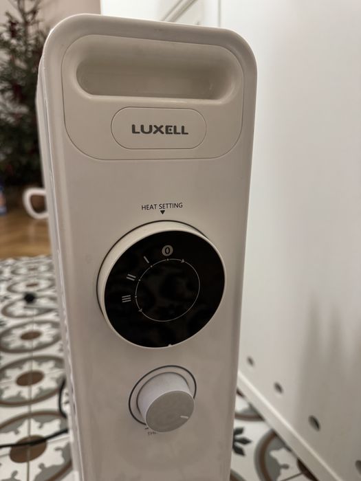 Масляний радіатор Luxell LUX-1225 на 9 секцій. Електричний обігрівач.