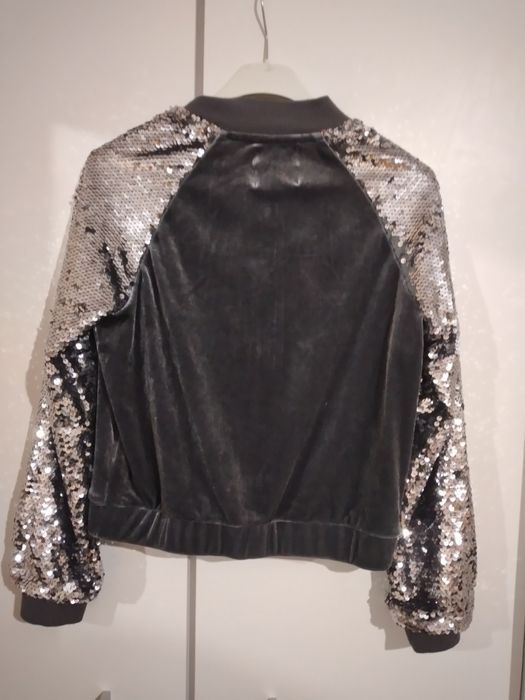 Bluza z cekinami rozmiar 146