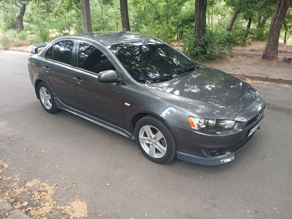 Продам lancer 2.0 акпп газ /бензин