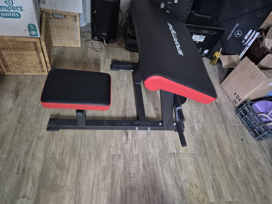 Maszyna do bicepsa , modlitewnik plus 4 talerz e po 2kg