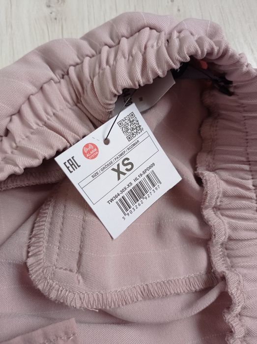 Spodnie z kantem House