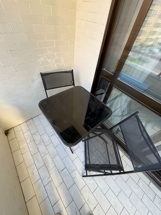 Conjunto mesa e cadeiras área externa jardim preto
