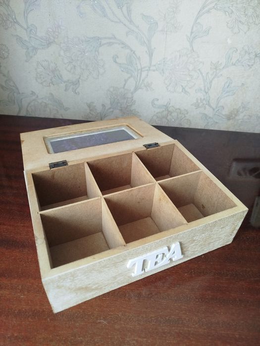 Дерев'яна коробка для зберігання чаю