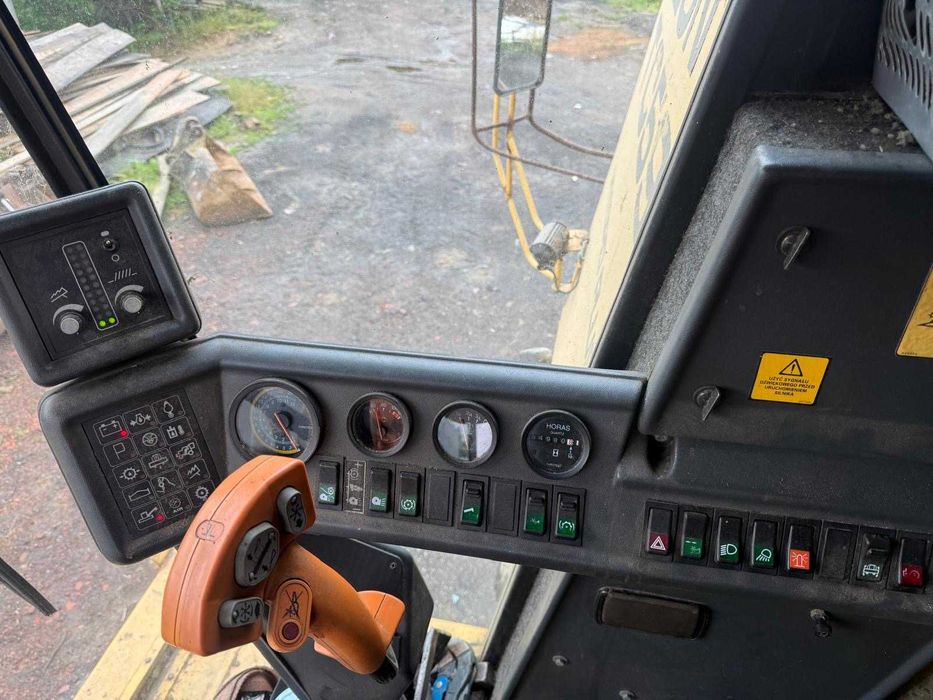 Kombajn New Holland / Bizon tc59