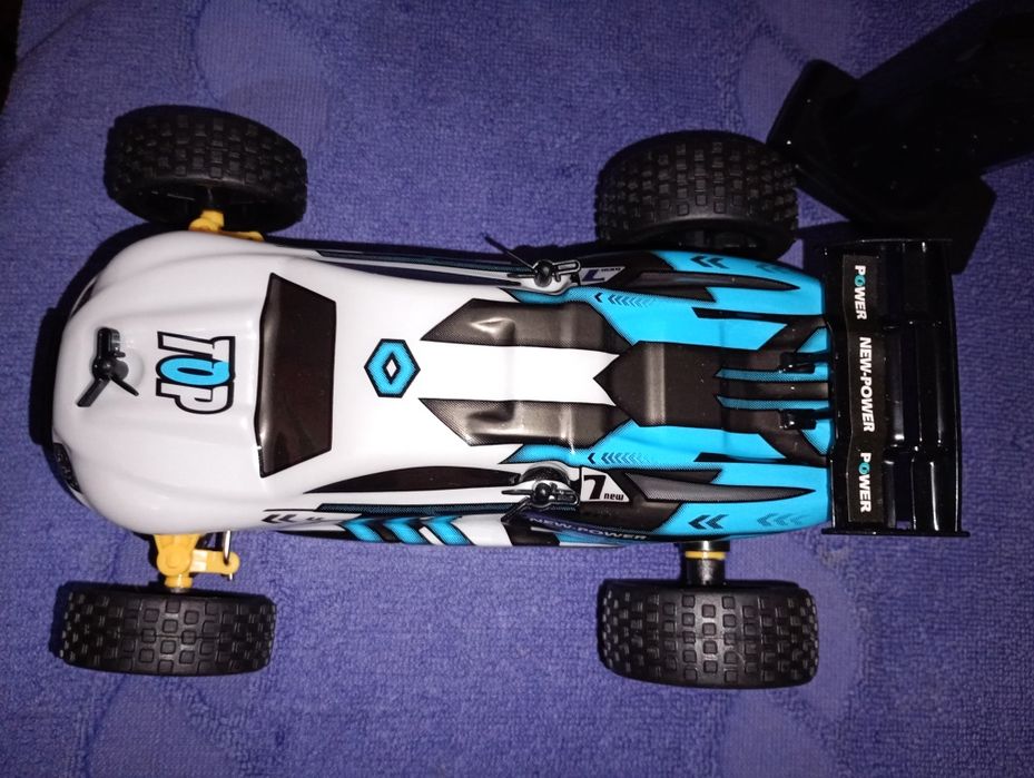Samochód zdalnie sterowany  TECNOCK QY1802A 2.4 GHz skala 1:22