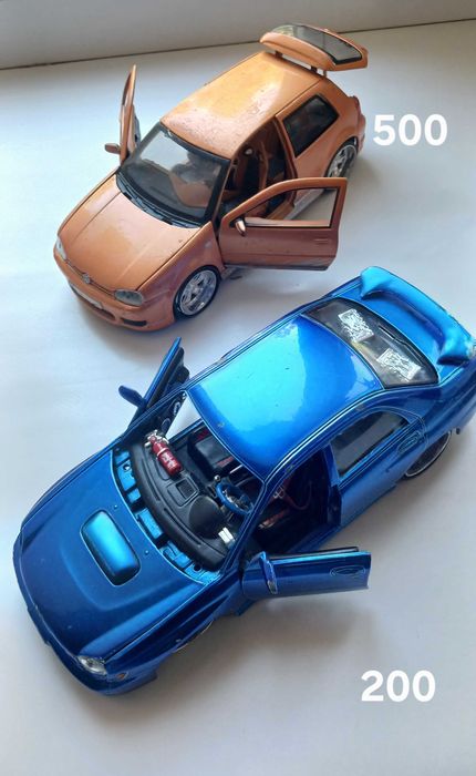 Колекційні моделі машинок 1:24 Maisto Welly