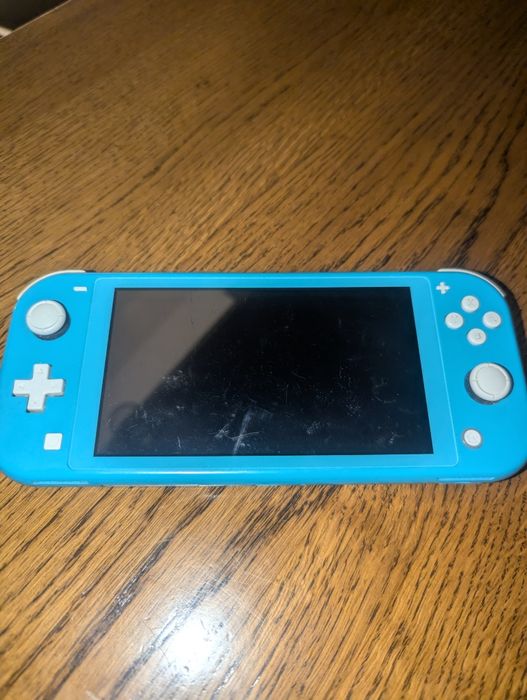 NINTENDO SWITCH LITE 64 + sd карта на 128гб  KeFiR