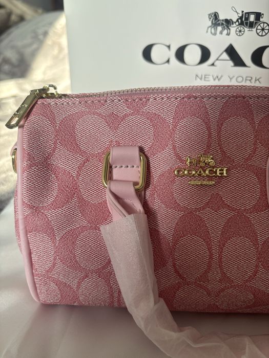 Mala Coach rosa nova