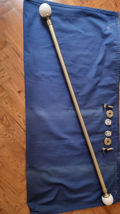 Varão para cortinados dourado