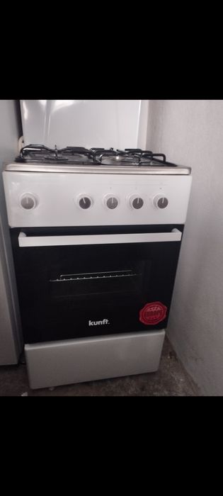 Cozinha com botijão de gás, cafeteira, liquidificador e torradeira nov