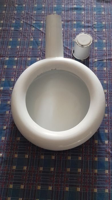 Arrastadeira/urinol antigo