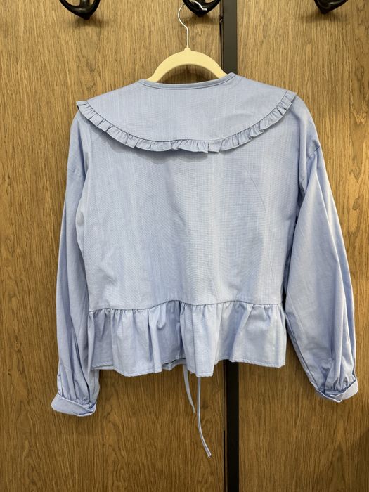 Блуза з рюшами